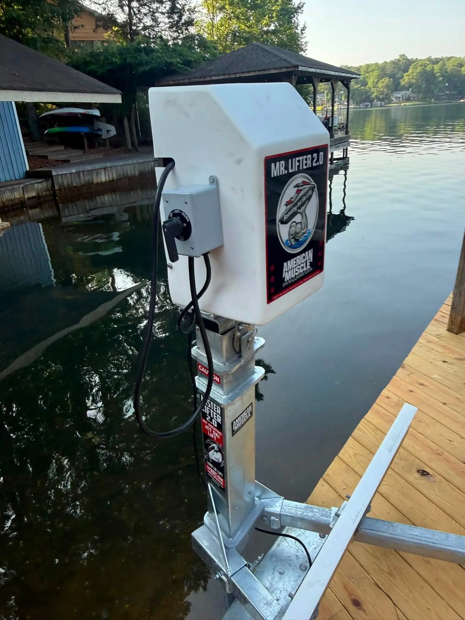 New dock with an electric jet ski lift on the lake