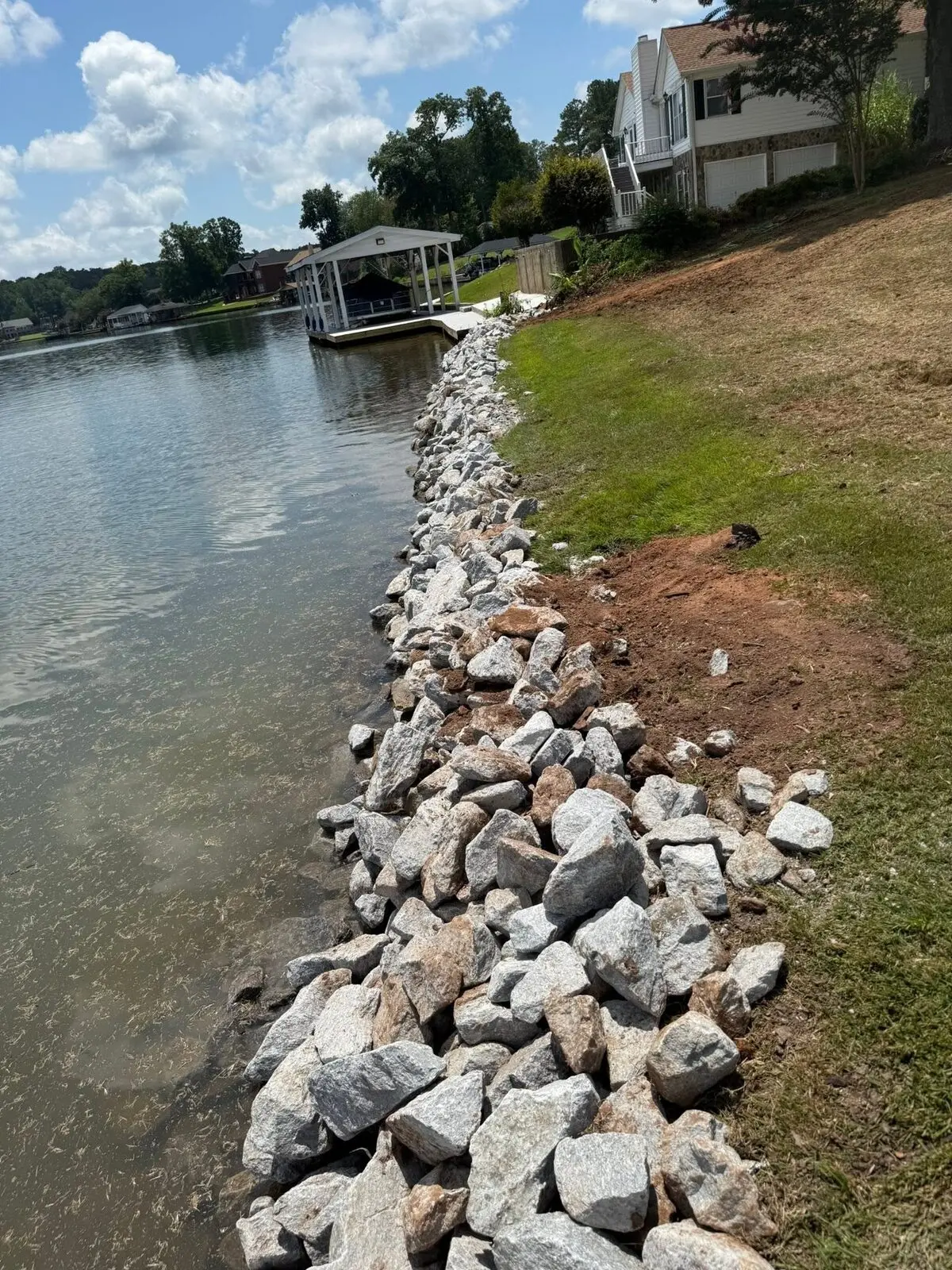 Rip-rap seawall repair along a Fairfield Plantation shoreline